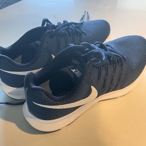 Navy blue Nike running sneakers